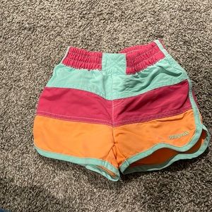 Patagonia board shorts 12-18months. Excellent condition.